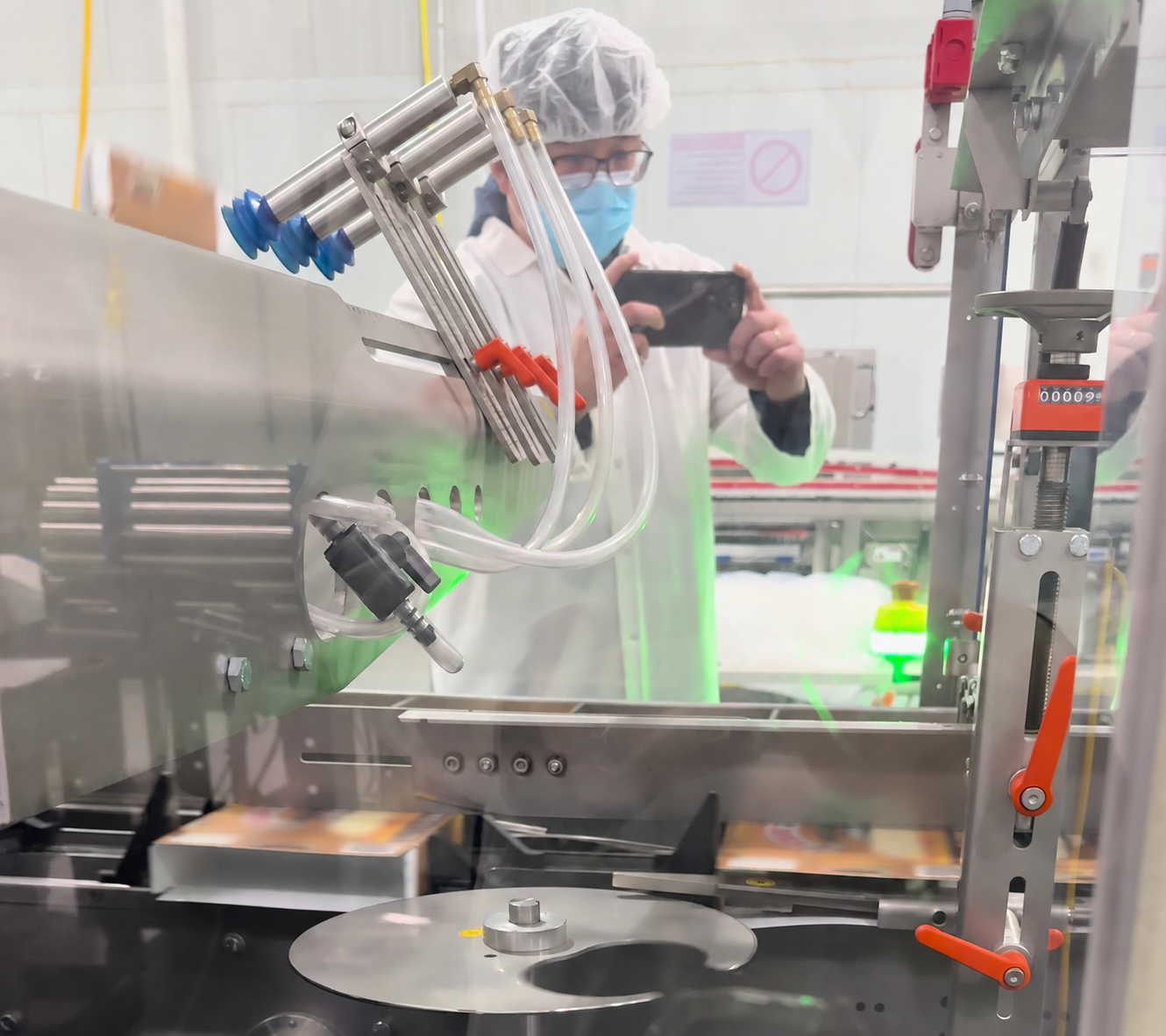 Graph-Pak's technical team on site at a customer's cartoning line